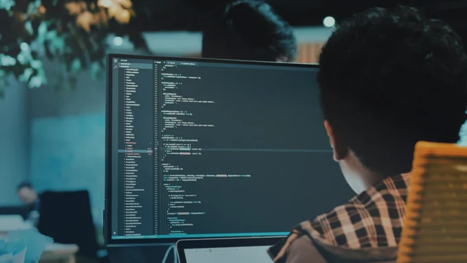 Lines of code on a desktop computer screen.