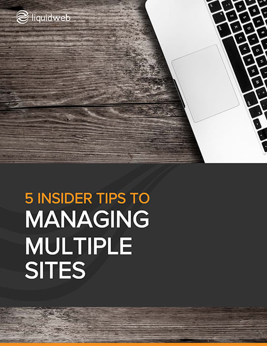 A laptop sitting on wood table 