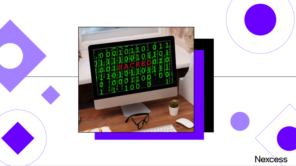 A laptop screen showing a website being hacked. 