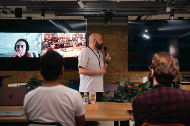 An example of a hybrid event where both live and virtual audiences are participating