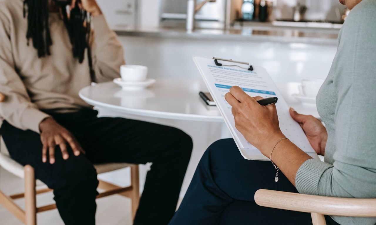 Hiring Manager Looking at a Freelancer’s Design Portfolio