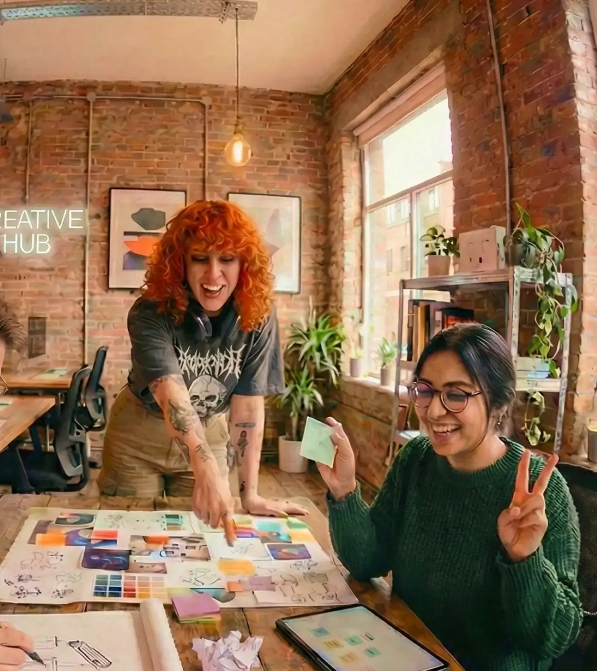 two women looking at project planning board