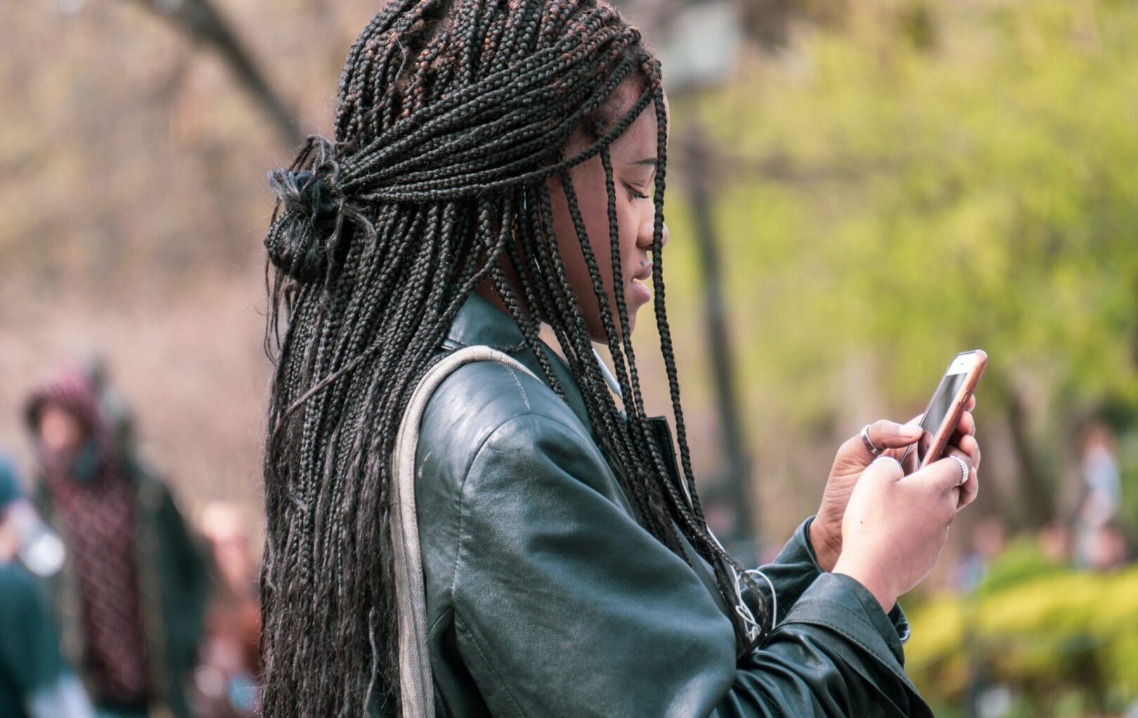 person using phone outside